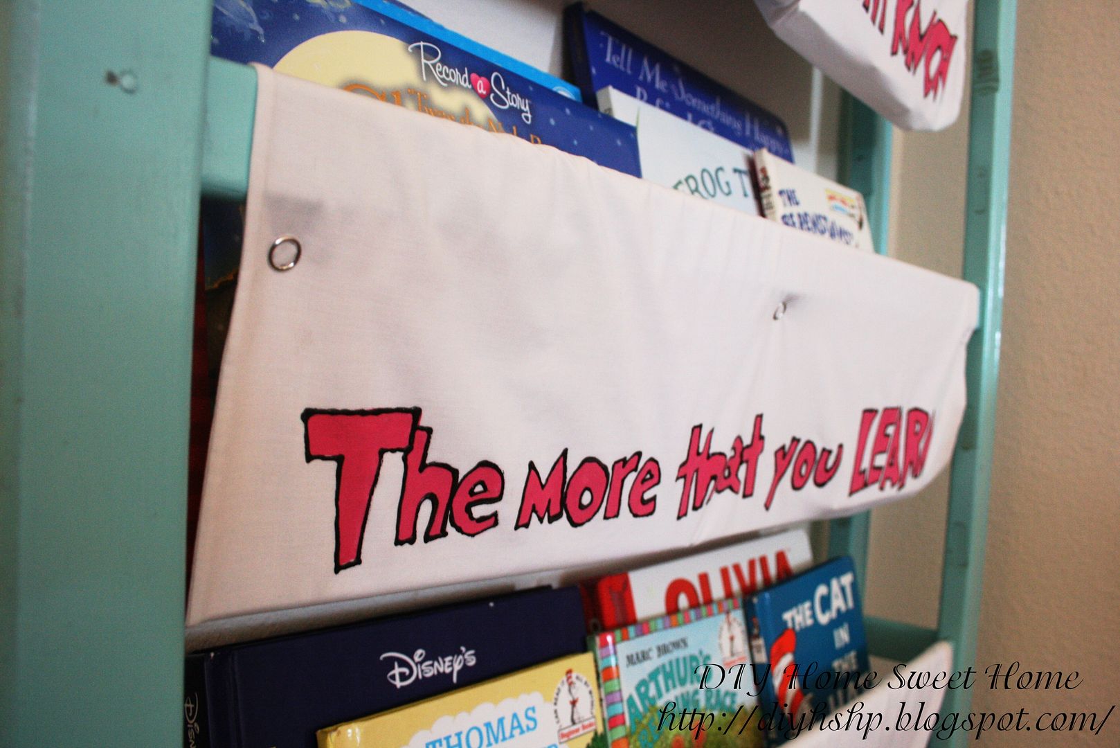 DIY Home Sweet Home Repurposed Crib into Book Storage